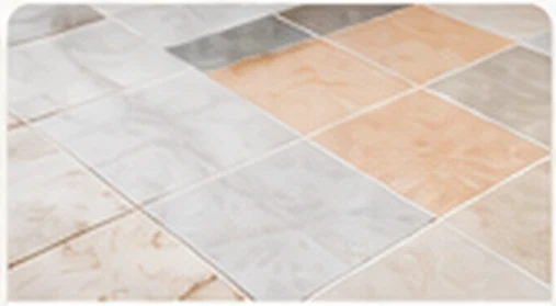 Neutral floor tiles arranged in a grid